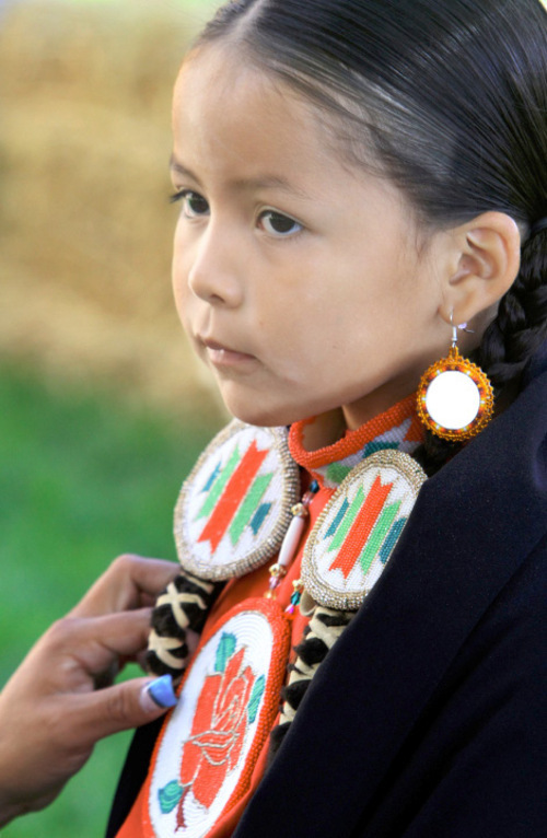 Rick Egan  |  The Salt Lake Tribune

Tyler Nez, 7, gets ready for some Native American dancing for the Western Legends Round Up on Saturday in Kanab.