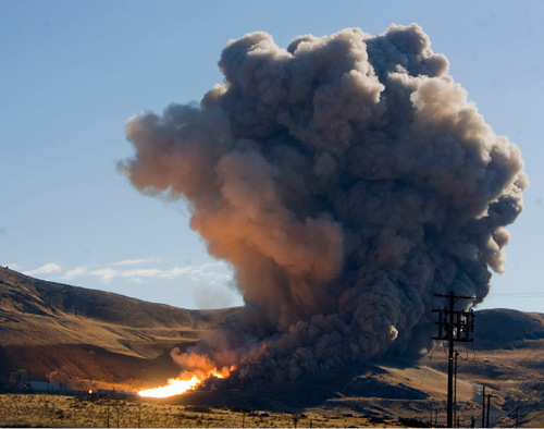 Al Hartmann  |  Salt Lake Tribune
The static test fire of the first stage of an Ares 1 rocket at ATK west of Brigham City went off on time without a hitch on Tuesday, Aug. 31, at 9:27 a.m.