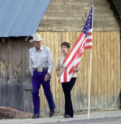 Steve Griffin  |  The Salt Lake Tribune&#xA; &#xA;Deon and Dixie Mecham, of Kanab, make their way to Valley High School in Orderville, UT to pay their respects to  Kane County Deputy Sheriff officer Brian Harris  during viewing Thursday, September 2, 2010. Deon has known the Harris family for over 35 years.