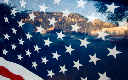 Steve Griffin  |  The Salt Lake Tribune&#xA; &#xA;The flag blows in the breeze outside Valley High School in Orderville, UT as people pay their respects during the viewing for  Kane County Deputy Sheriff officer Brian Harris at  Thursday, September 2, 2010. Harris was killed in the line of duty.