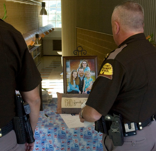 Steve Griffin  |  The Salt Lake Tribune
 
Utah Highway Patrol officers pay their respects during the viewing for  Kane County Deputy Sheriff officer Brian Harris at Valley High School in Orderville, UT  Thursday, September 2, 2010. Harris was killed in the line of duty.