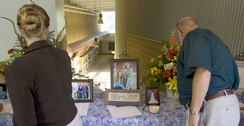 Steve Griffin  |  The Salt Lake Tribune&#xA; &#xA;People pay their respects with hand written notes during the viewing for Kane County Deputy Sheriff officer Brian Harris at Valley High School in Orderville, UT  Thursday, September 2, 2010. Harris was killed in the line of duty.