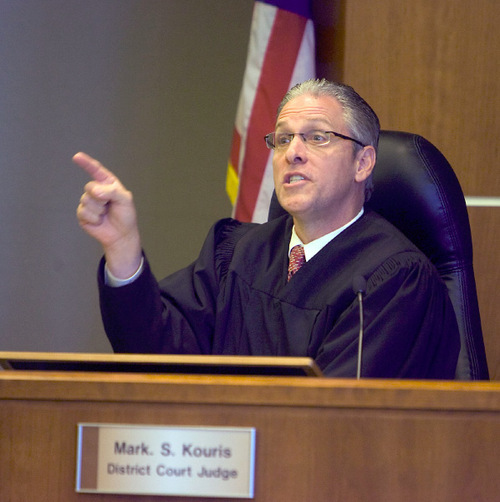 Al Hartmann  |  Salt Lake Tribune 
Judge Mark Kouris scolds Reginald Campos during sentencing in his 3rd District courtroom in West Jordan on Thursday, Sept. 2.  Campos was sentenced for attempted murder and aggravated assault for shooting and paralyzing neighborhood watch advocate David Serbeck in Bluffdale.