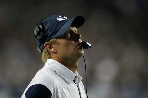 BYU coach Bronco Mendenhall looks to heavens for an answer to his quarterback issues. The BYU coach has tried to play both Riley Nelson and Jake Heaps, with decidedly mixed results. Tribune file photo by Trent Nelson.
