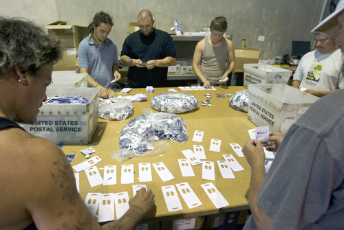 Steve Griffin  |  The Salt Lake Tribune
Molding Box employees work together to fill a blister pack order at the company's offices in Draper in September. The company prints documents on a big scale, copies CDs and DVDs in a mass production way and handles shipping for a variety of companies, is in the top 100 of Inc. magazine's fastest-growing companies for 2010.