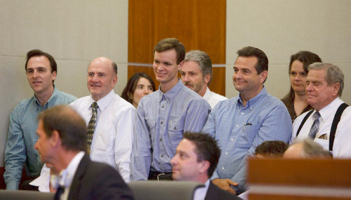 Trent Nelson  |  The Salt Lake Tribune&#xA;Followers of polygamous leader Warren Jeffs (front row) stand as he is led into the courtroom Tuesday. Jeffs, the leader of the FLDS Church, appeared before Judge Terry Christiansen in Third District Court  in West Jordan. (The three people in the back row are not FLDS members.)