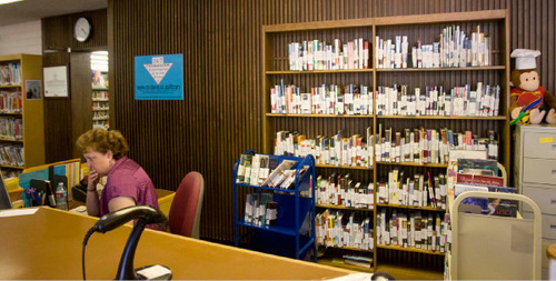 Paul Fraughton  |  The Salt Lake Tribune&#xA;Books on hold are stored at the front counter of the overcrowded  Davis County library in  Farmington  on  Friday, Sept. 3, 2010. A new library is in the works as part of a  complete renovation of the Davis County campus facilities.