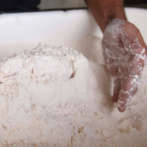 Trent Nelson  |  The Salt Lake Tribune&#xA;
3. Cover the batter with flour. Kevin Larose demonstrates the process of creating a deep-fried pickle at the Utah State Fair on Thursday, Sept. 9, 2010 in Salt Lake City.