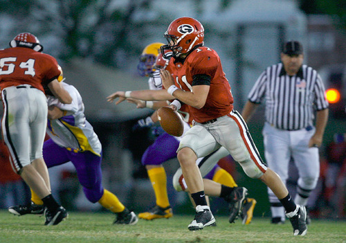 Scott Sommerdorf  l  The Salt Lake Tribune&#xA;Grantsville QB Bridger Bowman sprints out looking to pass late in the 2nd quarter. The 2A San Juan Broncos beat the 3A Grantsville Cowboys 18-7, Friday, September 10, 2010.