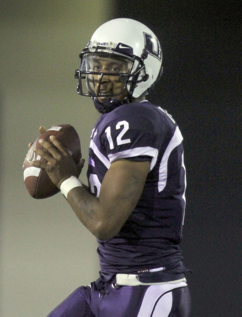 Rick Egan   |  The Salt Lake Tribune&#xA;&#xA;QB Diondre Borel (12) throws the ball for the Aggies, in football action,  Utah State vs. Idaho State football game, Saturday, September 11, 2010.