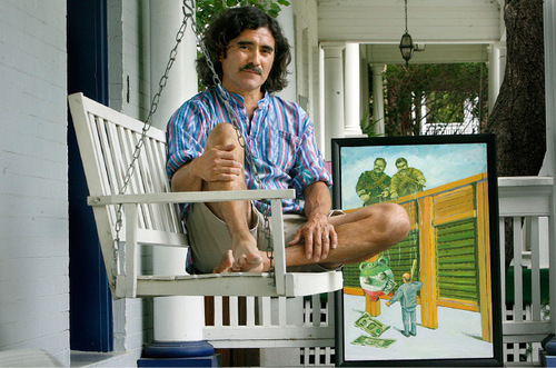 Scott Sommerdorf  l  The Salt Lake Tribune&#xA;Artist Jimmy Lucero sits on the deck of his home with his painting 