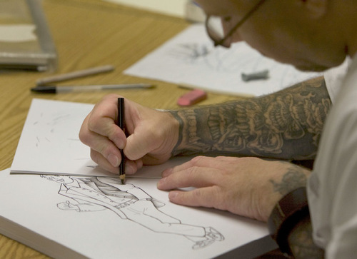 Steve Griffin  |  The Salt Lake Tribune&#xA; &#xA;Inmate art student Danny Pliego works on a drawing during art class at the Utah State Prison in Riverton Tuesday, September 7, 2010.