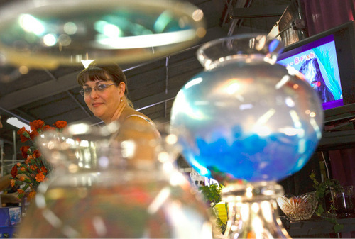 Leah Hogsten  |  The Salt Lake Tribune&#xA;Billie Jenkins from Hutchinson, Kan., peddles South African Killifish at the fair in Salt Lake City on Tuesday, September 14, 2010. The miniscule fish eggs are dehydrated, much like in a drought in their natural environment, and come to life in water in a matter of hours. The Utah State Fair features unique commercial sales booths that feature barkers pitching magic pans, Ginza knifes, funeral packages and shower and tub inserts.