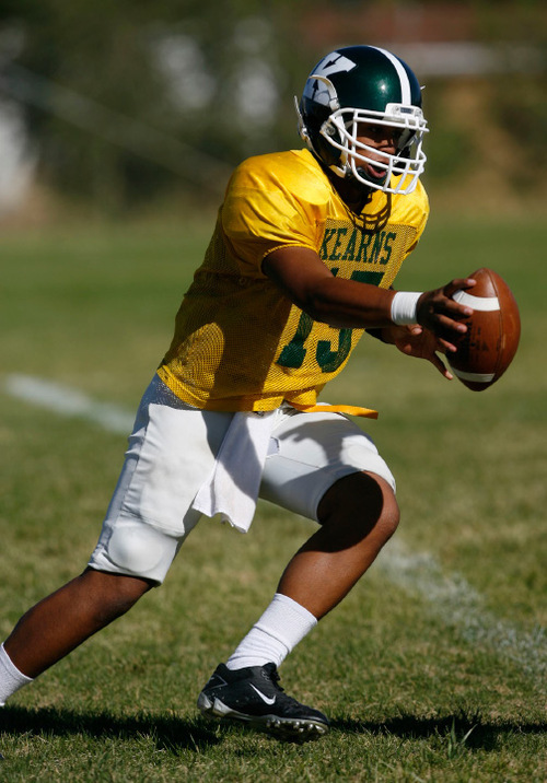 Francisco Kjolseth  |  The Salt Lake Tribune&#xA;The young Kearns team, led by quarterback J.R. Finai, pictured, are off to another solid start as the team practices on their field in Kearns.&#xA;Kearns, Sept. 13, 2010.