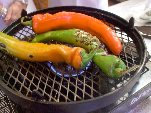 Kathy Stephenson  |  The Salt Lake Tribune&#xA;&#xA;Grilling fresh peppers over an open flame blisters their skin and releases their rich flavors.