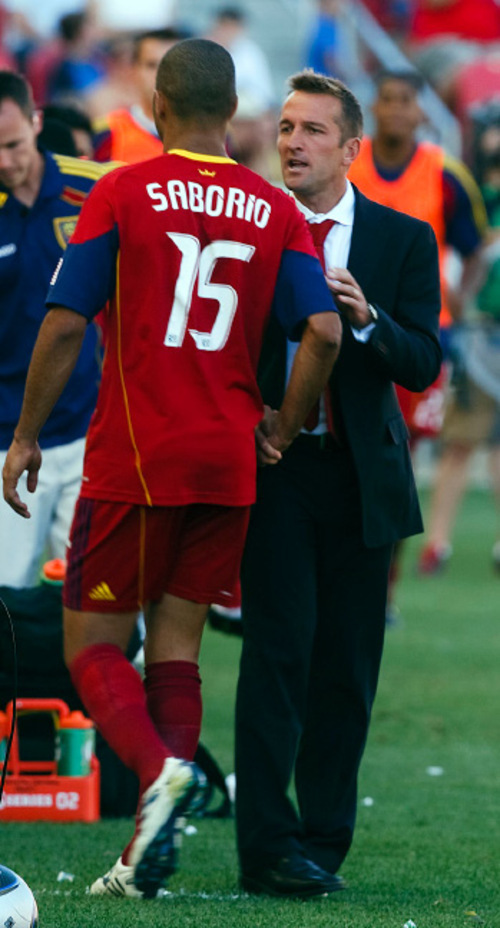 Leah Hogsten  |  The Salt Lake Tribune 
Real's Alvaro Saborio is congratulated as he exits the field in the second half by head coach Jason Kreis. 
Real Salt Lake defeated the Chicago Fire 1-0  at Rio Tinto Stadium Saturday, September 18, 2010, in Sandy.