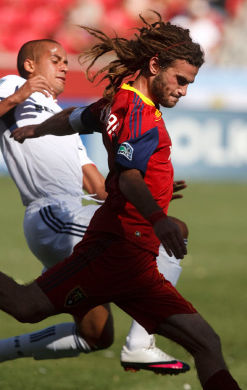 Leah Hogsten  |  The Salt Lake Tribune &#xA;Real's Kyle Beckerman battles Chicago's Gonzalo Segares. &#xA;Real Salt Lake defeated the Chicago Fire 1-0  at Rio Tinto Stadium Saturday, September 18, 2010, in Sandy.