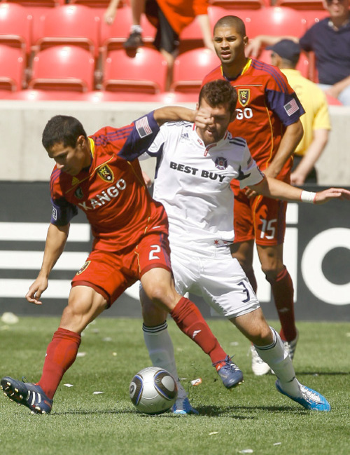 Leah Hogsten  |  The Salt Lake Tribune &#xA;Real's Tony Beltran battles Chicago's Calen Carr. &#xA;Real Salt Lake defeated the Chicago Fire 1-0  at Rio Tinto Stadium Saturday, September 18, 2010, in Sandy.