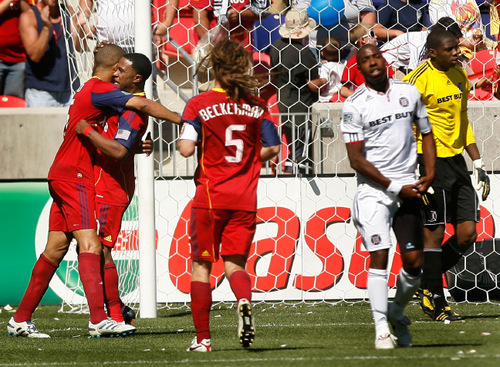 Leah Hogsten  |  The Salt Lake Tribune &#xA; Real's Robbie Findley  bear hugs Alvaro Saborio (left) after Saborio scored on a penalty kick, while teammate Kyle Beckerman joins the celebration. &#xA;Real Salt Lake defeated the Chicago Fire 1-0  at Rio Tinto Stadium Saturday, September 18, 2010, in Sandy.