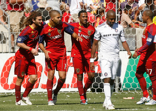 Leah Hogsten  |  The Salt Lake Tribune 
 Real's l-r  Kyle Beckerman, Alvaro Saborio and Robbie Findley  celebrates Saborio score on a penalty kick.Real Salt Lake defeated the Chicago Fire 1-0  at Rio Tinto Stadium Saturday, September 18, 2010, in Sandy.