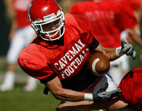 Francisco Kjolseth  |  The Salt Lake Tribune&#xA;Nate Cummings, a safety with American Fork loses momentary contact with the ball during a recent practice. American Fork looked like one of the worst teams in 5A early in the football season. After scoring just 27 points through its first three games, it didn't look like the team was adjusting to first-year coach Aaron Behm's new option offense. But in region 4 games, American Fork has bested Cyprus and darling Jordan. Could it be that the Utah County school might actually be a playoff team by the end of the year?&#xA;American Fork, Sept. 21, 2010.