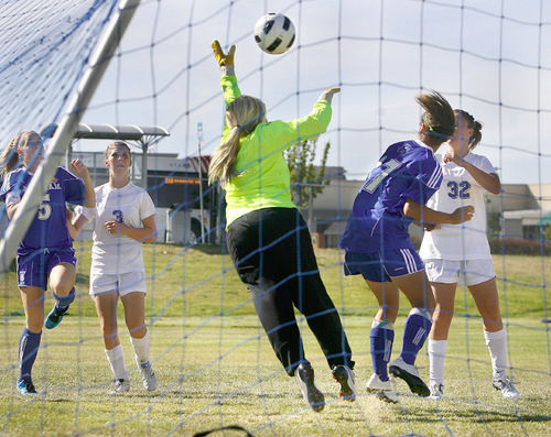 Scott Sommerdorf  l  The Salt Lake Tribune&#xA;Taylorsville goalkeeper Rachael Newby jumps, but cannot stop this shot by Bingham's Carla Swenson during first half play. Taylorsville team mates Megan Moser (3) and Whitney Mitchell (32) watch. Bingham beat Taylorsville 5-1 in a girl's soccer game played at Taylorsville, Thursday, September 16, 2010.