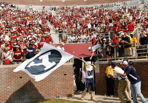 Trent Nelson  |  The Salt Lake Tribune&#xA;BYU mascot Cosmo waves the Y flag before the team took the field at BYU vs. Florida State, college football Saturday, September 18, 2010 at Doak Campbell Stadium in Tallahassee, Florida.