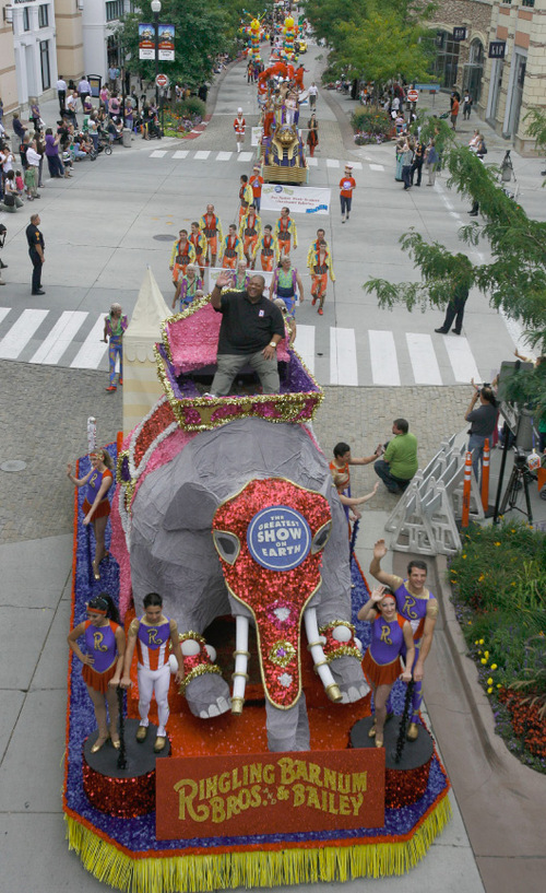 Rick Egan   |  The Salt Lake Tribune&#xA;&#xA;&#xA;Big Budah rides an elephant in the Elephant Parade at The Gateway in Salt Lake City on Wednesday, Sept. 22, 2010.   It was Elephant Appreciation Day as the Ringling Bros. and Barnum & Bailey Circus rolled into town.
