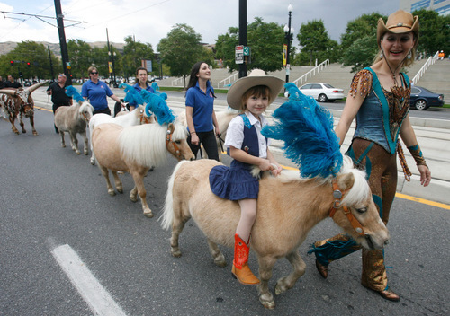 Rick Egan   |  The Salt Lake Tribune&#xA;&#xA;&#xA;Five-year-old Sofia Petrov rides a miniature horse as her mother, Victoria Vsilak, walks along side, in the Elephant Parade at The Gateway in Salt Lake City on Wednesday, Sept. 22, 2010.    It was Elephant Appreciation Day as the Ringling Bros. and Barnum & Bailey Circus rolled into town.
