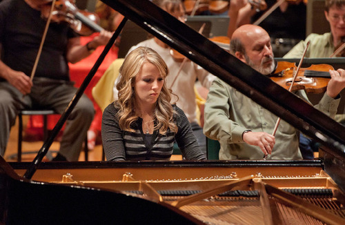 Michael Mangum  |  The Salt Lake Tribune
Natalie Coombs rehearses with the Utah Symphony at Abravanel Hall in Salt Lake City on Monday, September 20, 2010. The Salute to Youth performance will feature nine local soloists and will be held on Tuesday, September 28, 2010.