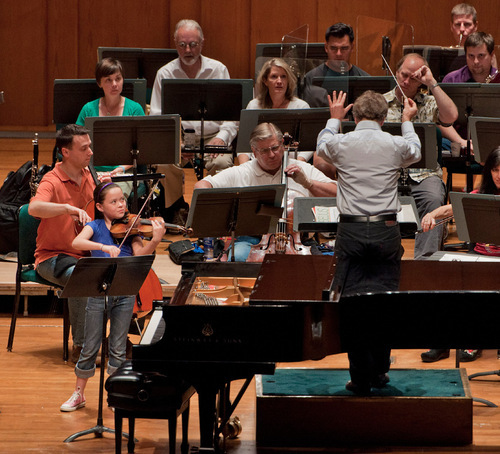 Michael Mangum  |  The Salt Lake Tribune
Shenae Anderson, front left, rehearses with the Utah Symphony at Abravanel Hall in Salt Lake City on Monday, September 20, 2010. The Salute to Youth performance will feature nine local soloists and will be held on Tuesday, September 28, 2010.