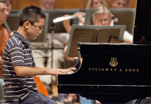 Michael Mangum  |  The Salt Lake Tribune
Anthony Cheng rehearses with the Utah Symphony at Abravanel Hall in Salt Lake City on Monday, September 20, 2010. The Salute to Youth performance will feature nine local soloists and will be held on Tuesday, September 28, 2010.