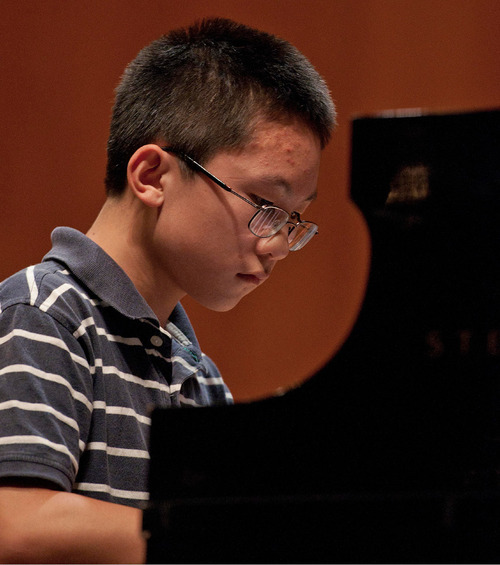 Michael Mangum  |  The Salt Lake Tribune
Anthony Cheng rehearses with the Utah Symphony at Abravanel Hall in Salt Lake City on Monday, September 20, 2010. The Salute to Youth performance will feature nine local soloists and will be held on Tuesday, September 28, 2010.