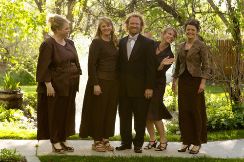 Janelle, from left, Christine, Kody Brown, Meri and Robyn, the Utah polygamist family in the new TLC series, 