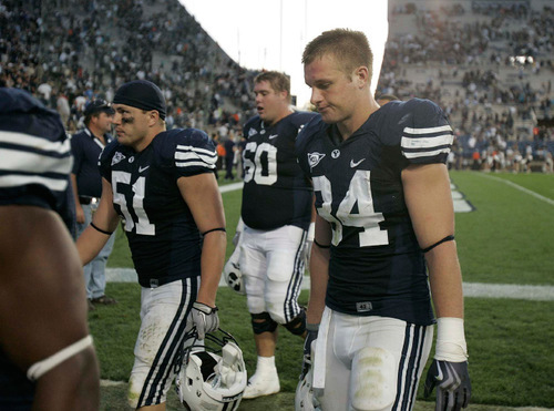 Trent Nelson  |  The Salt Lake Tribune&#xA;BYU players, including linebacker Shane Hunter (51), offensive lineman Terence Brown (60) and linebacker Austen Jorgensen (34) head to the locker room after the loss, BYU vs. Nevada, college football Saturday, September 25, 2010 at LaVell Edwards Stadium in Provo.