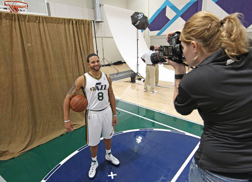 Utah Jazz's Deron Williams poses for a photo during the NBA basketball team's media day in Salt Lake City on Monday, Sept. 27, 2010. (AP Photo/George Frey)