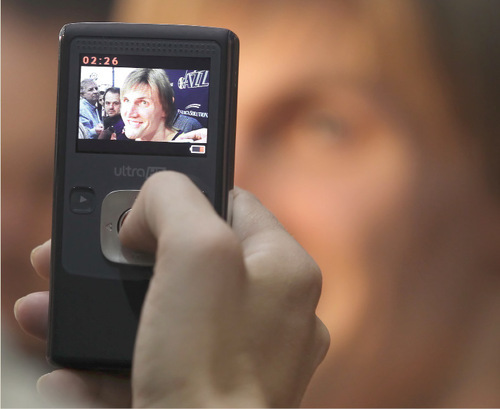 Utah Jazz's Andrei Kirilenko, from Russia, has a video of him taken by a reporter during the NBA basketball team's media day in Salt Lake City on Monday, Sept. 27, 2010. (AP Photo/George Frey)