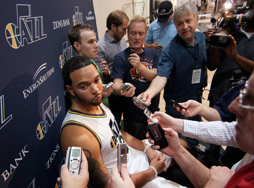 Utah Jazz's Deron Williams speaks with reporters during the NBA basketball team's media day in Salt Lake City on Monday, Sept. 27, 2010. (AP Photo/George Frey)