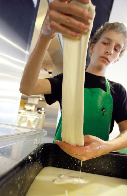 Francisco Kjolseth  |  The Salt Lake Tribune&#xA;Steve Floor begins to stretch cows milk cheese curd into mozarella recently at Caputo's Market in Salt Lake City. The 16-year-old makes several batches of fresh mozarella cheese each week. 