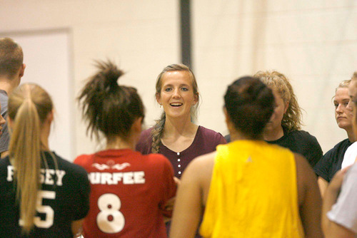 Paul Fraughton  |  The Salt Lake Tribune   Cottonwood volleyball coach Jenna Neves talks to her team during a practice.Salt Lake City  on  Monday,September 27, 2010