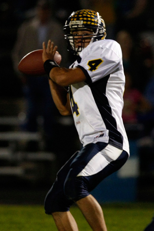 Chris Detrick  |  The Salt Lake Tribune &#xA;Enterprise's Slade Moyle #4 during the second half of the game at Beaver High School Friday October 1, 2010.