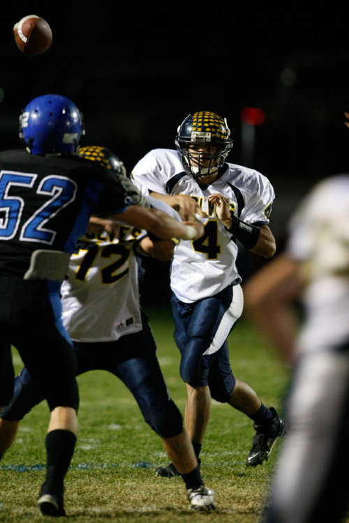 Chris Detrick  |  The Salt Lake Tribune &#xA;Enterprise's Slade Moyle #4 passes the ball during the first half of the game at Beaver High School Friday October 1, 2010.