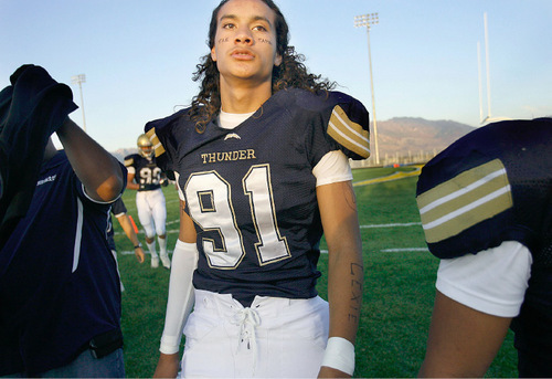 Scott Sommerdorf  l  The Salt Lake Tribune&#xA;Westlake DL Moana Ofahengaue (91) just before kickoff against Timpview at Westlake, Friday 10/1/2010. On his face 