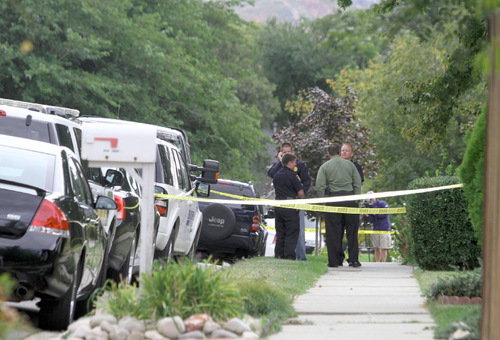 Rick Egan   |  The Salt Lake Tribune
Yellow tape surrounds a fourplex Monday where police are investigating a homicide on 200 East near 500 South in Bountiful. Tina Martin, 39, was found dead in her apartment.