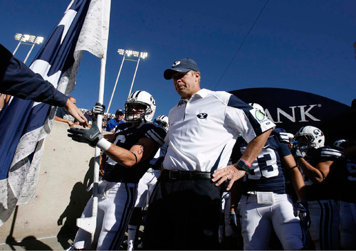 Trent Nelson  |  The Salt Lake Tribune&#xA;BYU receiver McKay Jacobson (6) and BYU coach Bronco Mendenhall prepare to take the field, BYU vs. Nevada, college football Saturday, September 25, 2010 at LaVell Edwards Stadium in Provo.