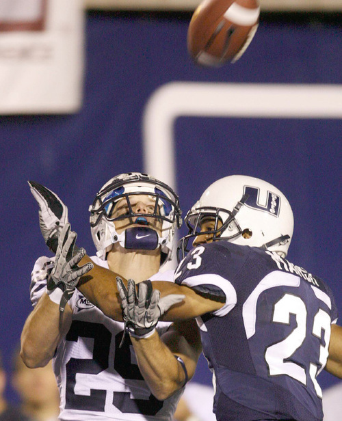 Trent Nelson  |  The Salt Lake Tribune&#xA;Utah State's Curtis Marsh defending the pass to BYU receiver Luke Ashworth (29). The pass was ruled incomplete. Utah State vs. BYU college football in Logan Friday, October 1, 2010.