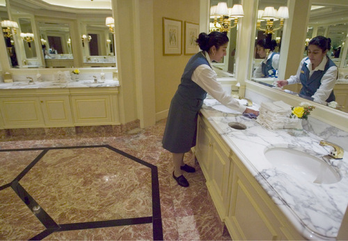 Jim Urquhart  |  The Salt Lake Tribune
Liza Rosas cleans a women's restroom at downtown Salt Lake City's Grand America Hotel, one of 10 candidates for 