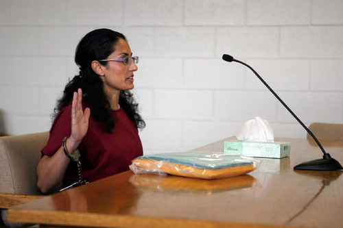 Francisco Kjolseth  |  The Salt Lake Tribune&#xA;Ferosa Bluff swears in before her parole hearing at the Utah State Prison in front of board member Angela Micklos who was presiding. Bluff and Andrew Fedorowicz are serving up to life in prison for the 1998 torture killing of Bluff's 3-year-old daughter Rebecca.&#xA;Draper, Oct. 5, 2010.