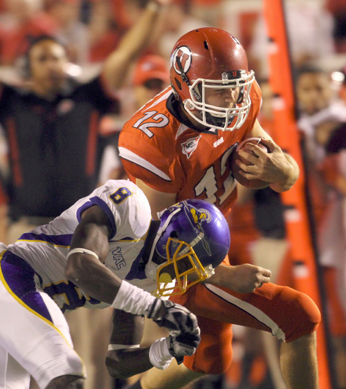 Rick Egan   |  The Salt Lake Tribune


 Griff Robles is chased down by Spartan, Brandon Driver (8) as he runs the ball for the Utes, during the Utah vs. San Jose State game at Rice-Eccles Stadium, Saturday, September 25, 2010.