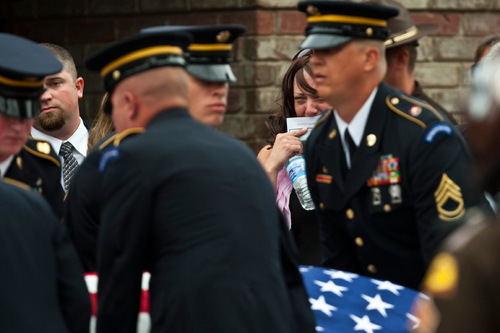 Chris Detrick  |  The Salt Lake Tribune &#xA;Brother Jason Wagstaff, left, and widow Tiffany Wagstaff grieve after the funeral service for U.S. Army Blackhawk helicopter pilot Matthew G. Wagstaff at Jenkins - Soffe Funeral Homes & Cremation Center Tuesday October 5, 2010.  Wagstaff, a 10-year veteran of the Army's 101st Airborne Division, died in a Sept. 21 helicopter crash in Afghanistan. It was his second deployment to Afghanistan. He also had served in Iraq.